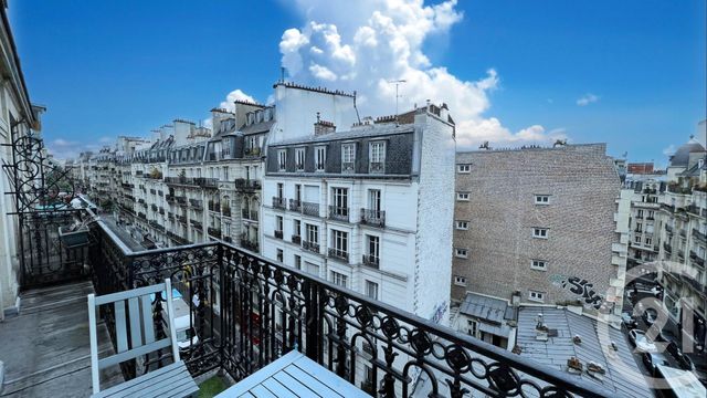 Afficher la photo en grand Appartement à louer - 2 pièces - 72.33 m2 - PARIS - 75018 - ILE-DE-FRANCE - Century 21 Prestige Montmartre