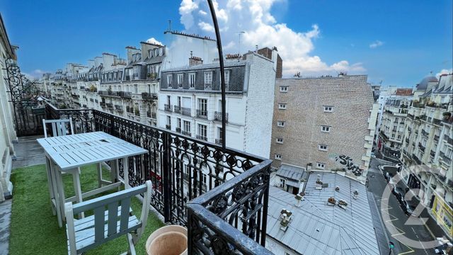 Afficher la photo en grand Appartement à louer - 2 pièces - 72.33 m2 - PARIS - 75018 - ILE-DE-FRANCE - Century 21 Prestige Montmartre