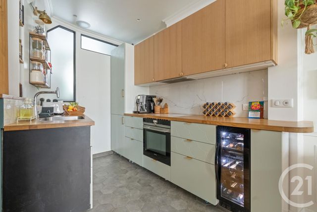 Appartement à vendre - 3 pièces - 53.46 m2 - PARIS - 75018 - ILE-DE-FRANCE - Century 21 Prestige Montmartre